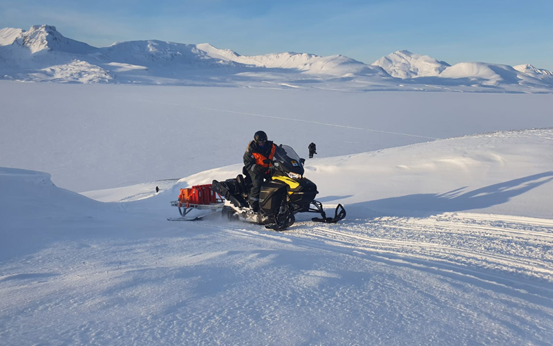 Hayden Pearson driving to fieldwork in central Spitsbergen. Image taken by fellow researcher Cody Barnett.